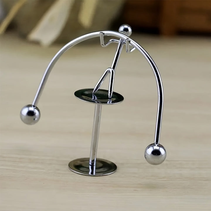 A Creative Kinetic Energy Lifting Weight Iron Art Decoration Small Novelty Gift Desktop Ornament